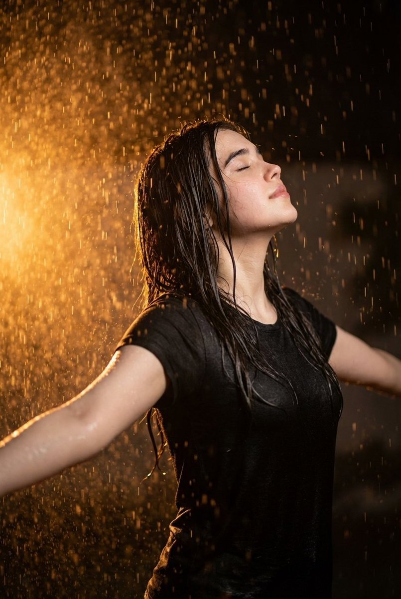 Cinematic Portrait of Woman in Rain with Orange Backlight (#nb_1259)