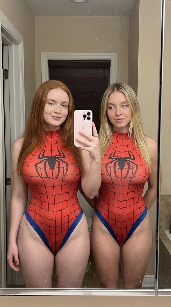 Two Women Mirror Selfie in Superhero Bodysuits (#nb_1143)